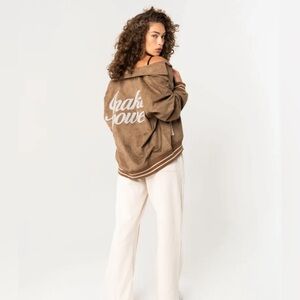 NWT Inaka Power unisex varsity jacket